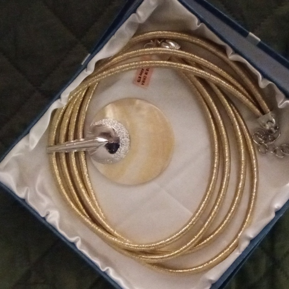 NWT Gold Mothet of Pearl corded pendant